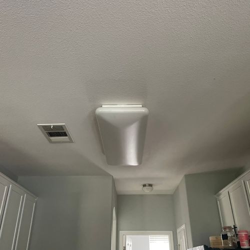 Excellent work replacing a high ceiling chandelier