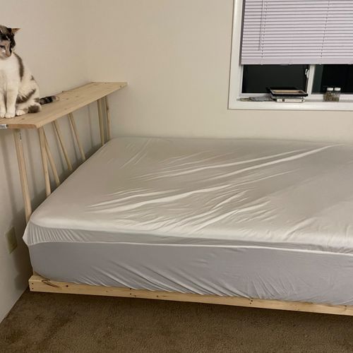 He built me a custom floating bedframe so that I c