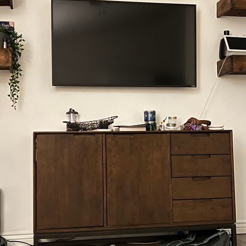 Hung TV and assembled cabinet 