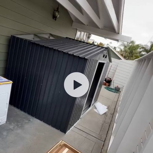 Rusty put together a large metal shed for us. He w