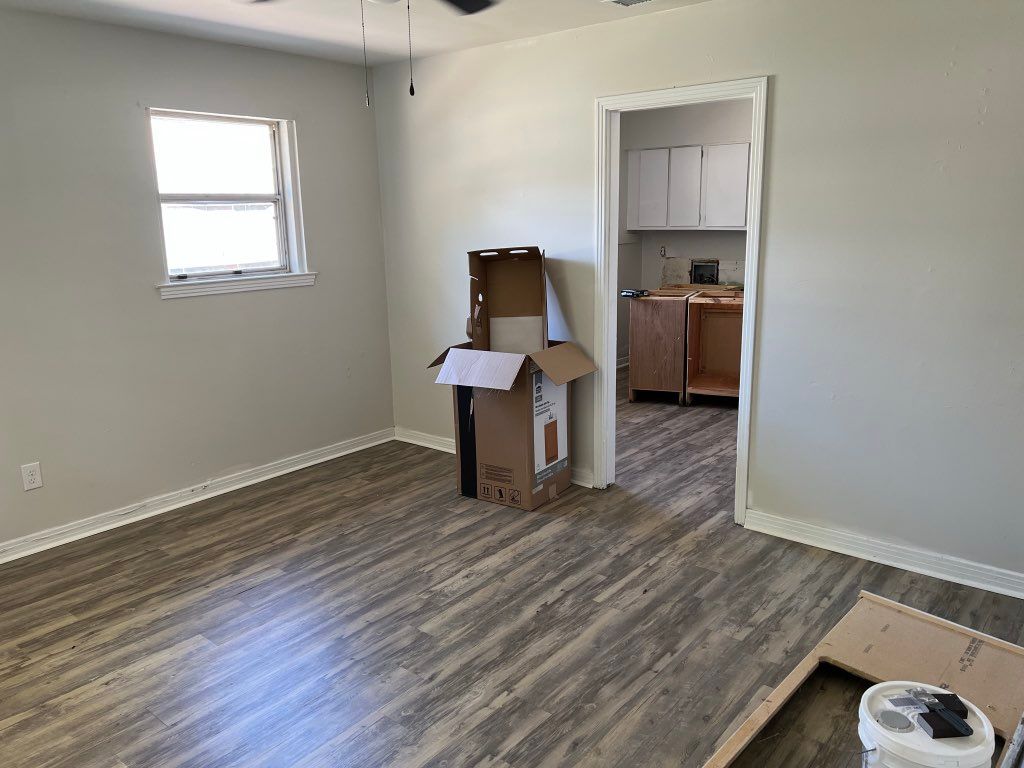 Installed floor, painted walls and installed trim