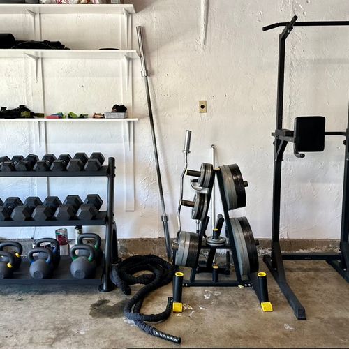 Dumbbell rack, battle ropes, weight plate pyramid,