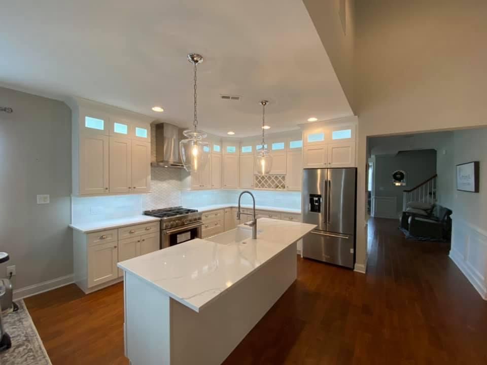 After the old maple cabinets with straight island 
