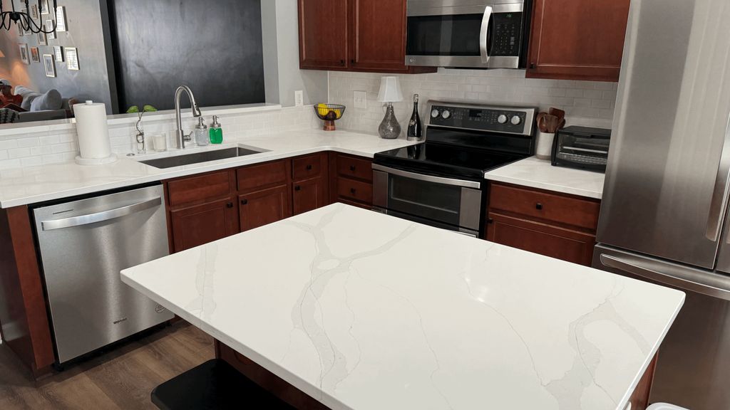 Calacatta Gold Quartz kitchen countertops in Ralei