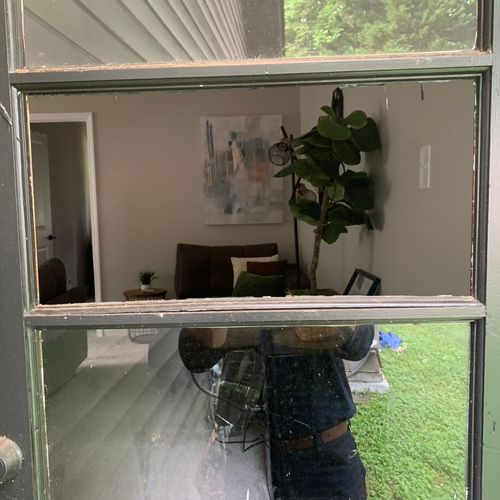 Replaced broken window pane In back door.