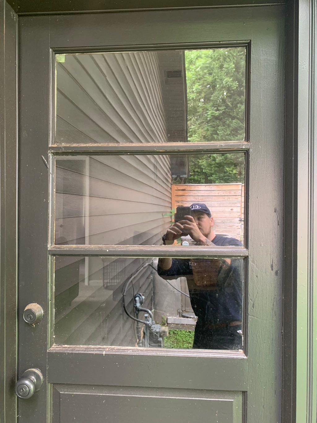 Replaced broken window pane In back door.