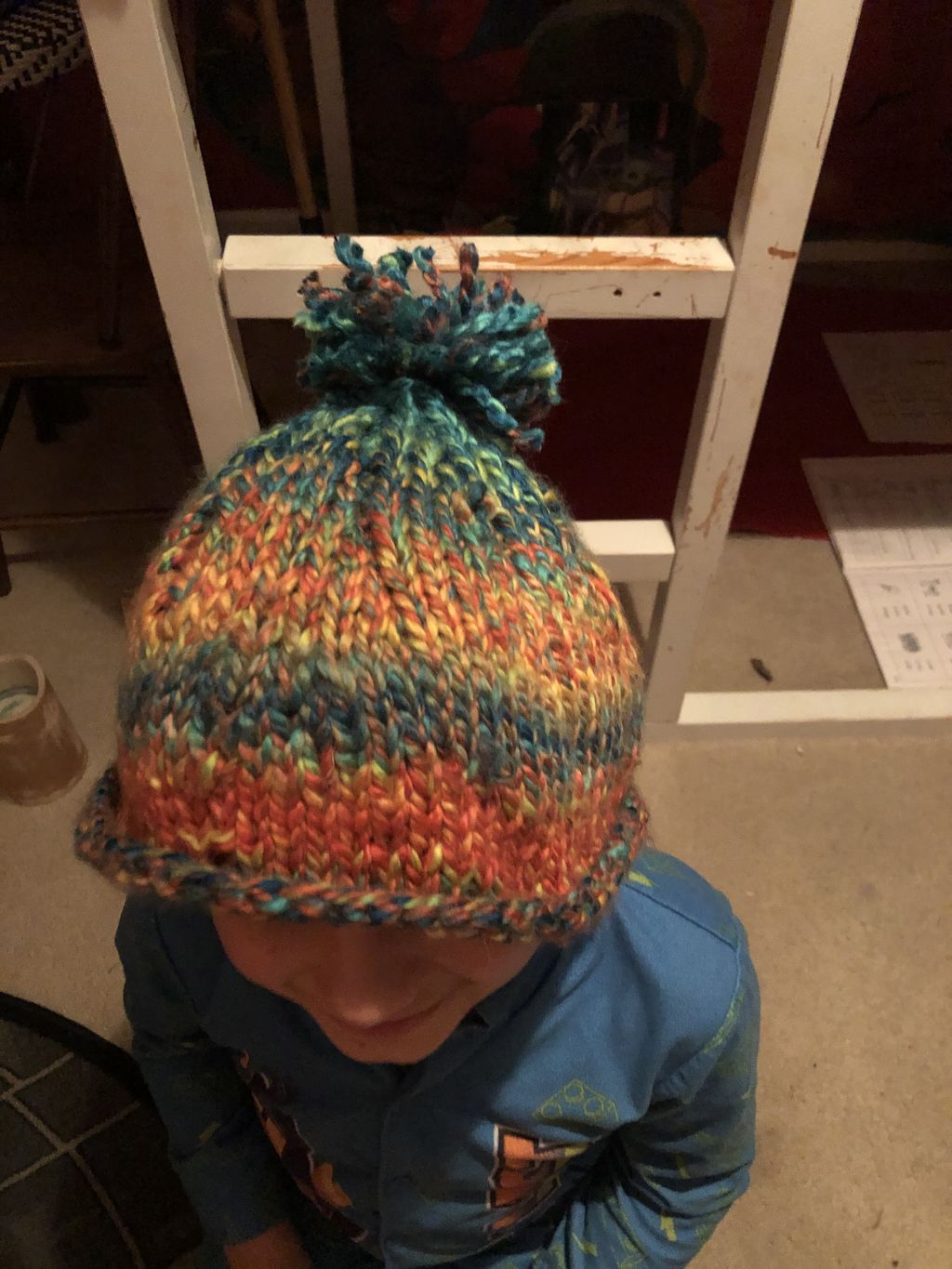 Double pointed Circular knitted hat by 9 year old 