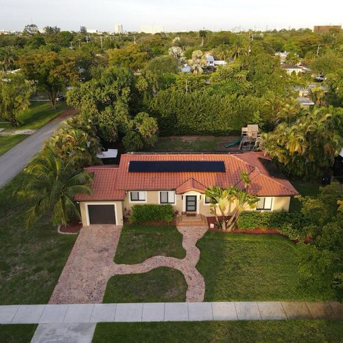 This Miami Springs home fully offsets its energy c