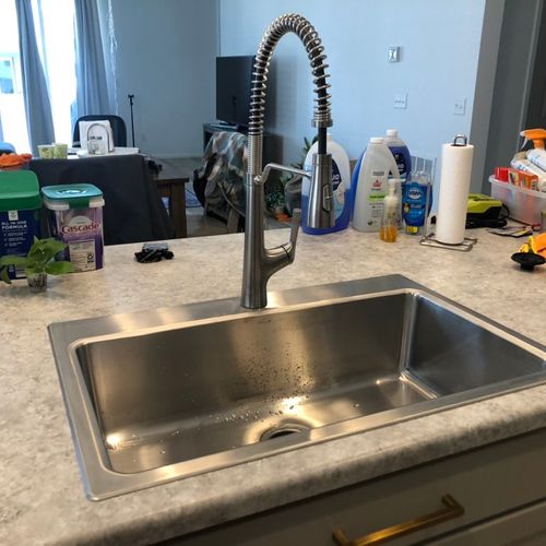 Installed sink, faucet and reset garbage disposal.