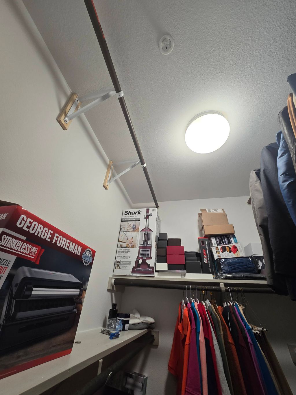 Assembled & added extra rods in closet for better 