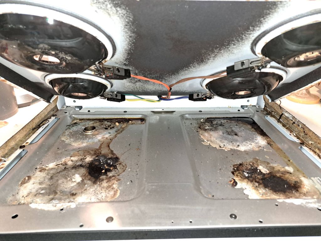 under the stove -dirty 