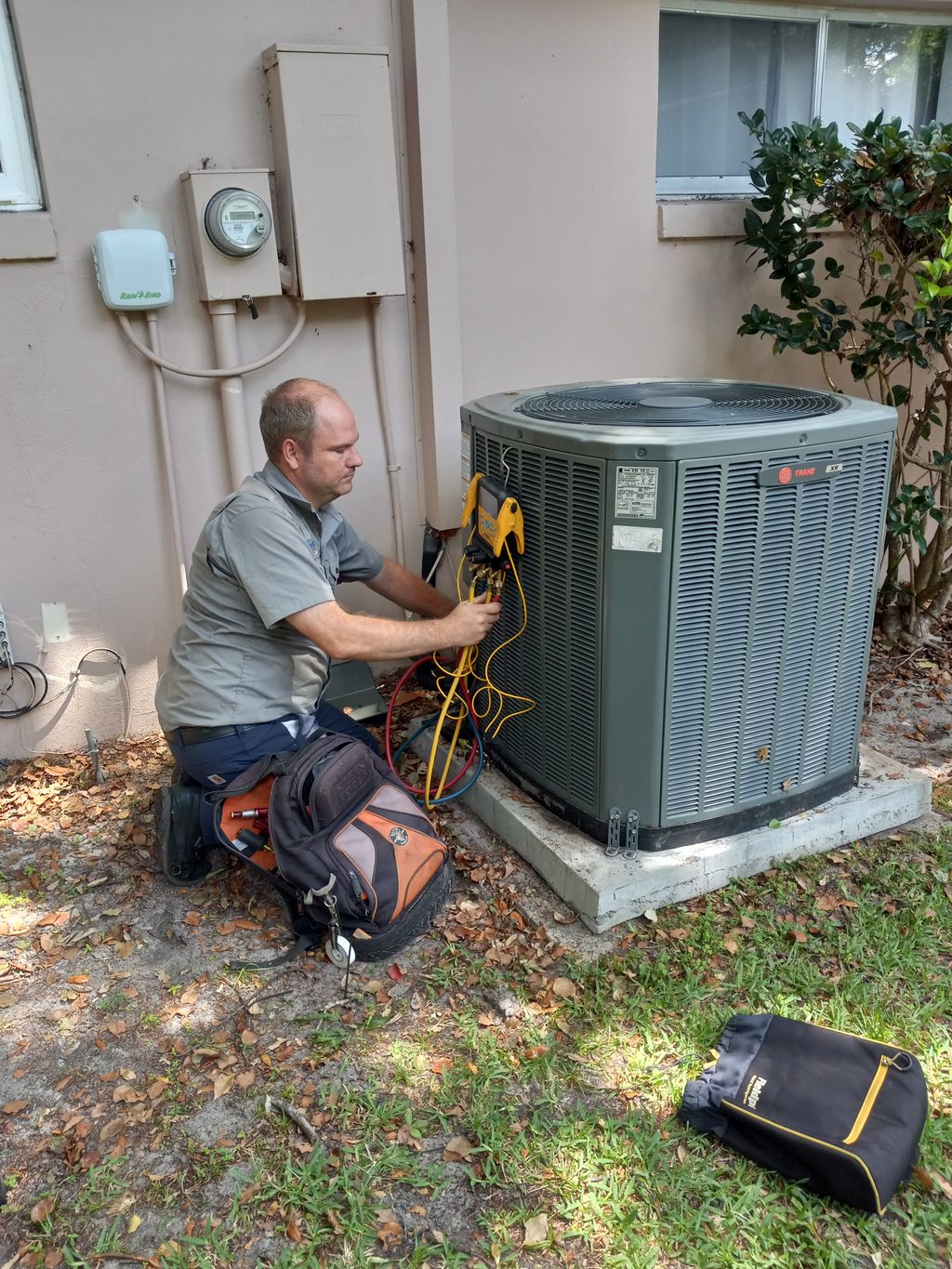 Justin F checking the refrigerant charge