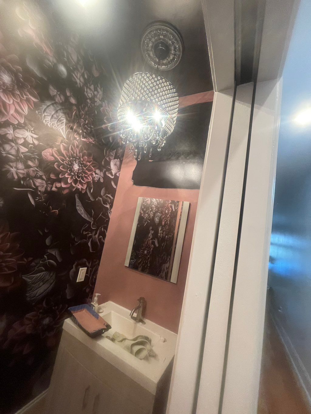 Love the wallpaper and where the bathroom color is