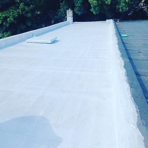 Flat roof repair and seal coat