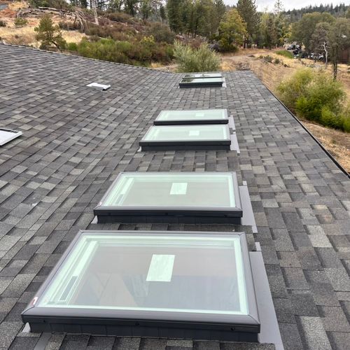 Roof extension over deck with skylights 