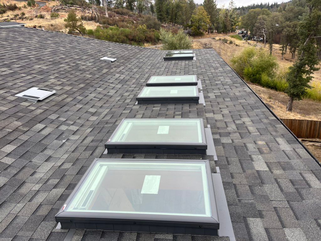 Roof extension over deck with skylights 