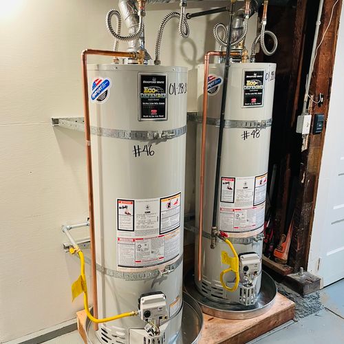 Double water heater for multi-unit complex