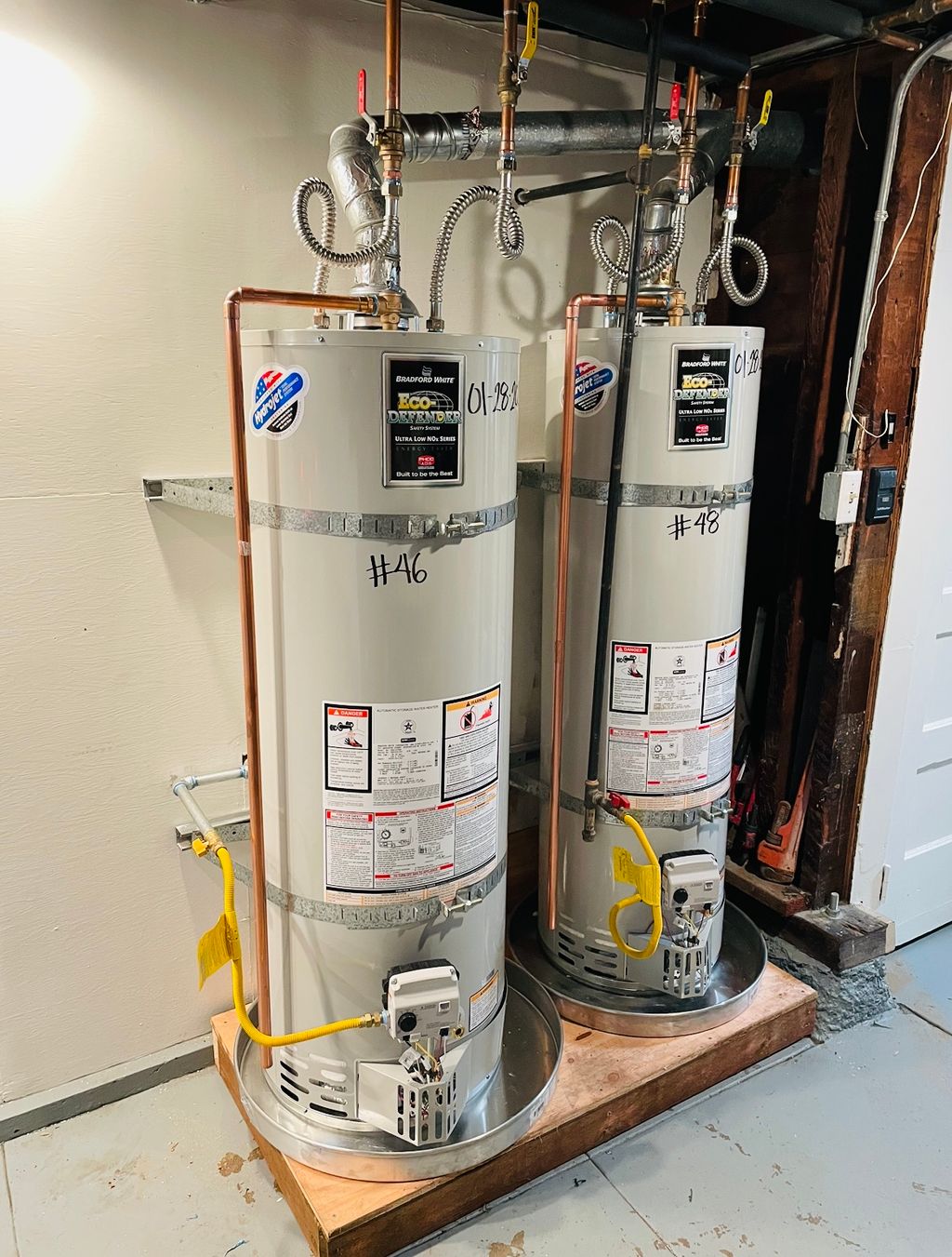 Double water heater for multi-unit complex