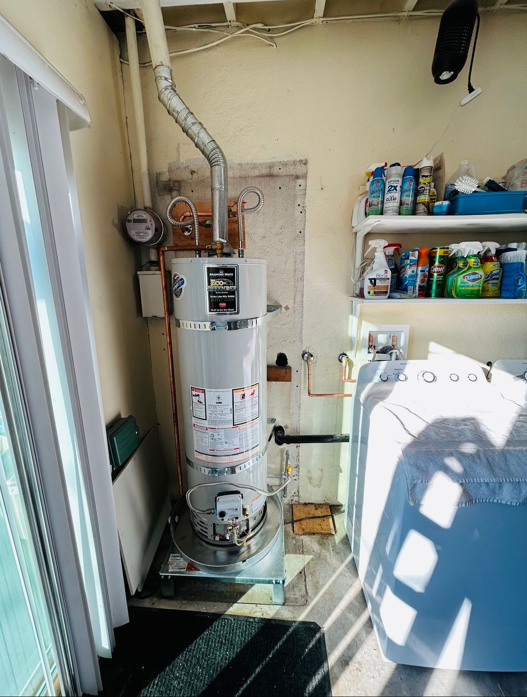 Water heater and laundry room