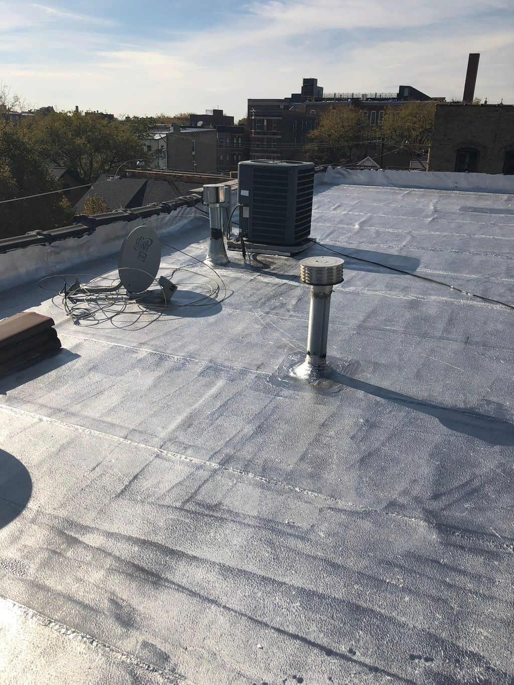 After flat roof repair and silver coating
