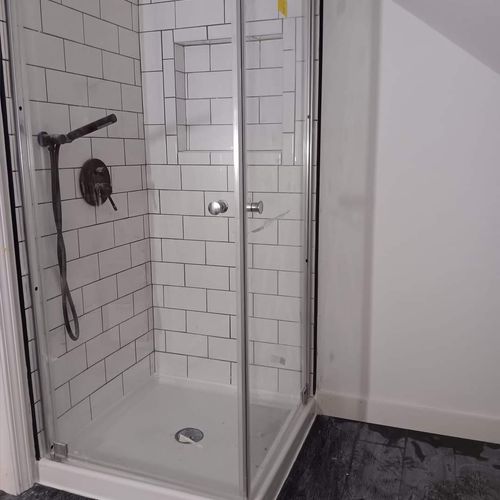 bathroom addition with custom tile shower