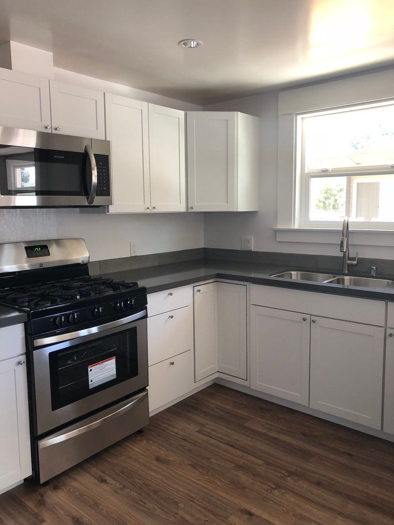 Cabinets layout and install. New floor. New window