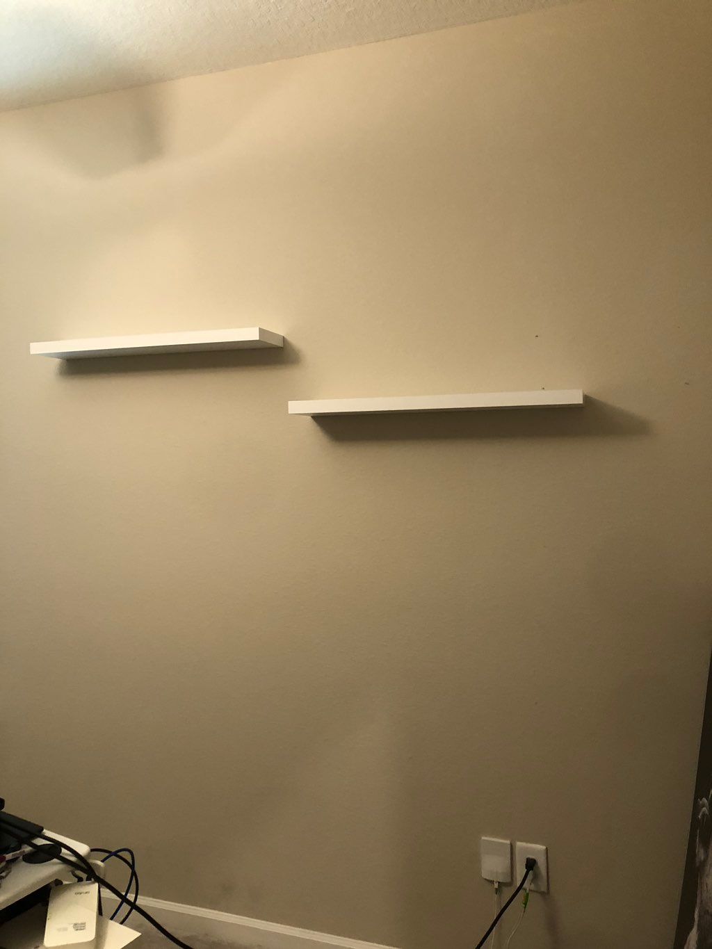 Floating shelf installation.
