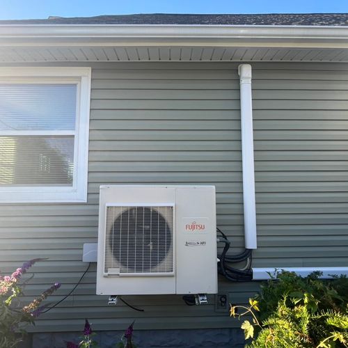 Ductless condenser hung on bracket with 3 in door 