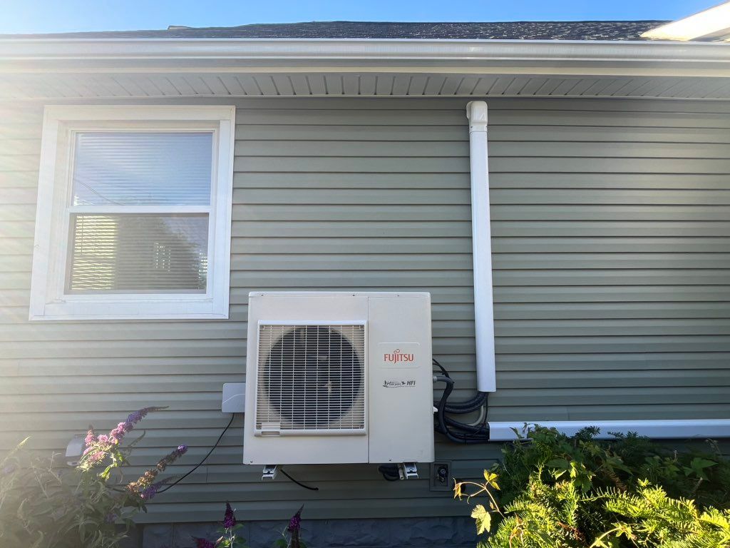 Ductless condenser hung on bracket with 3 in door 