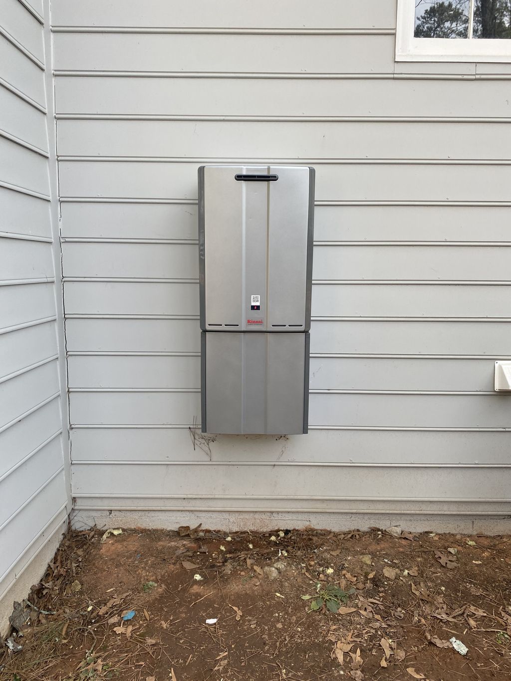 Outdoor Rinnai tankless water heater install 