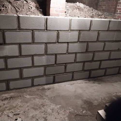 New cinderblock foundation wall, from preparation 