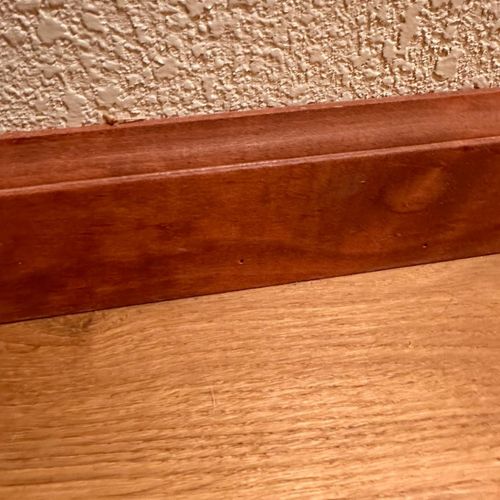 Artem installed skirting boards in our house.  it 