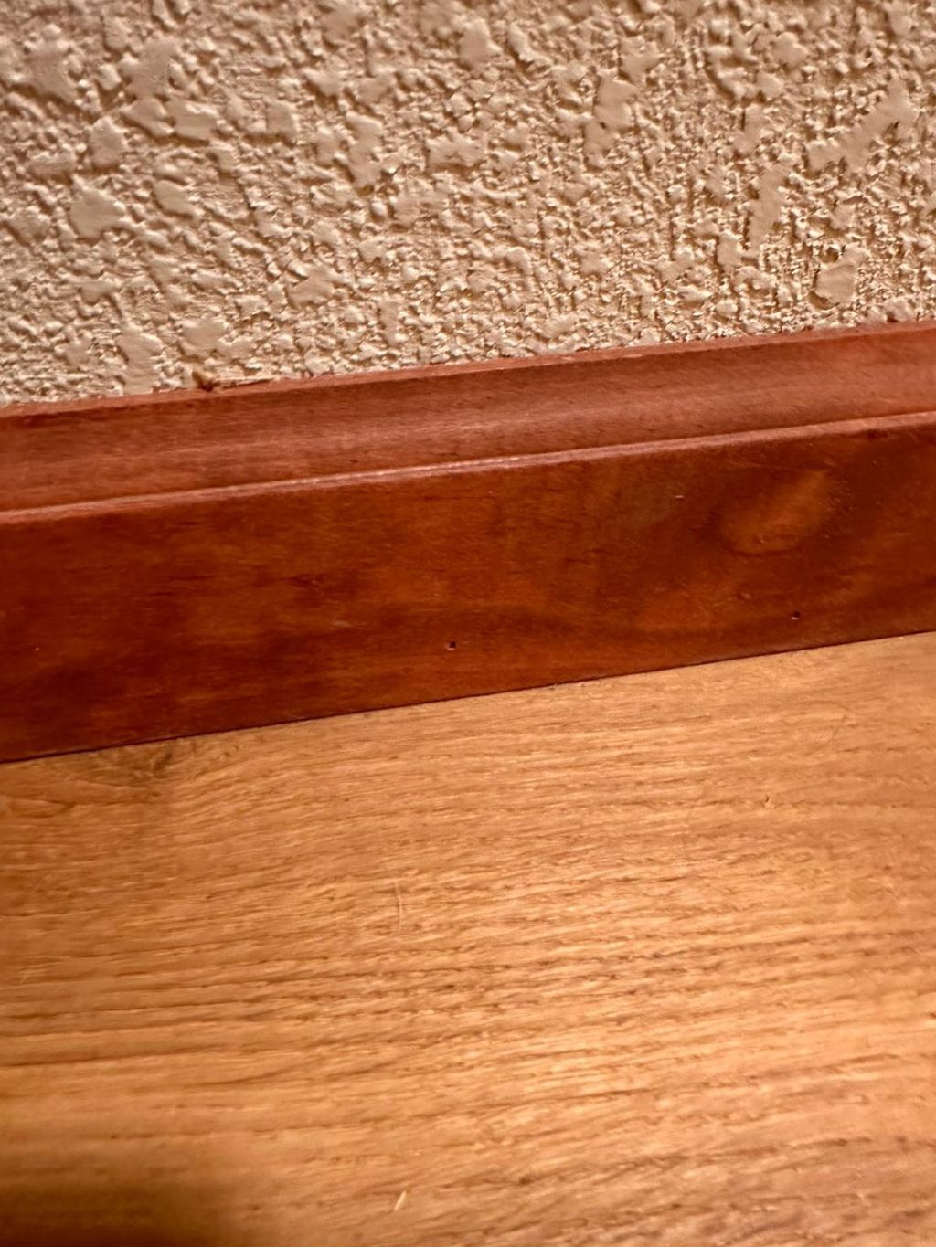 Artem installed skirting boards in our house.  it 