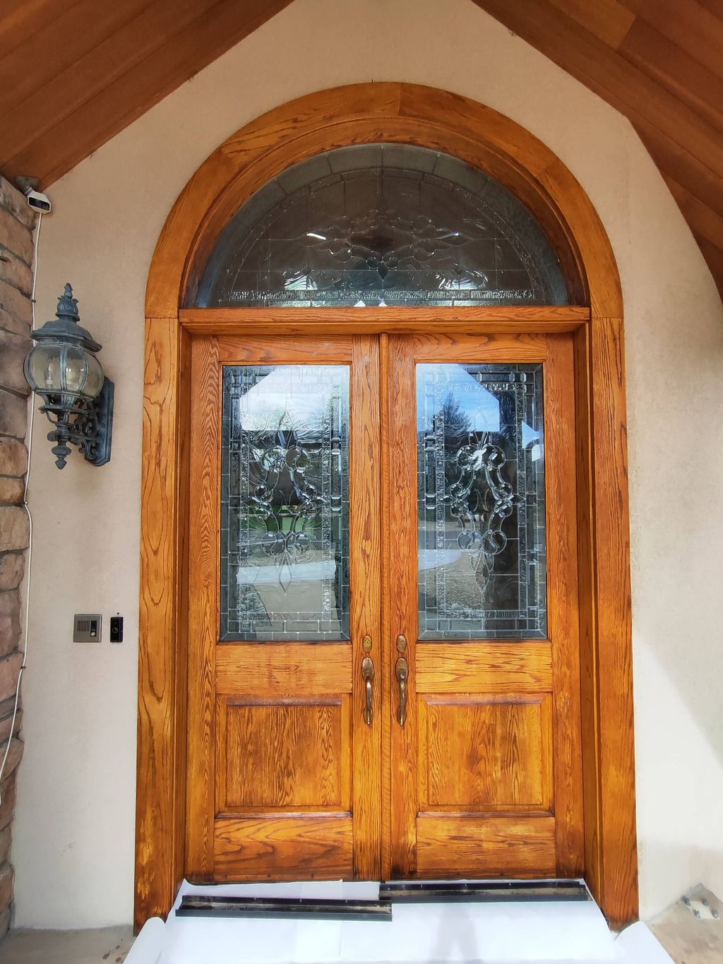 The door is stained and painted with two layers of