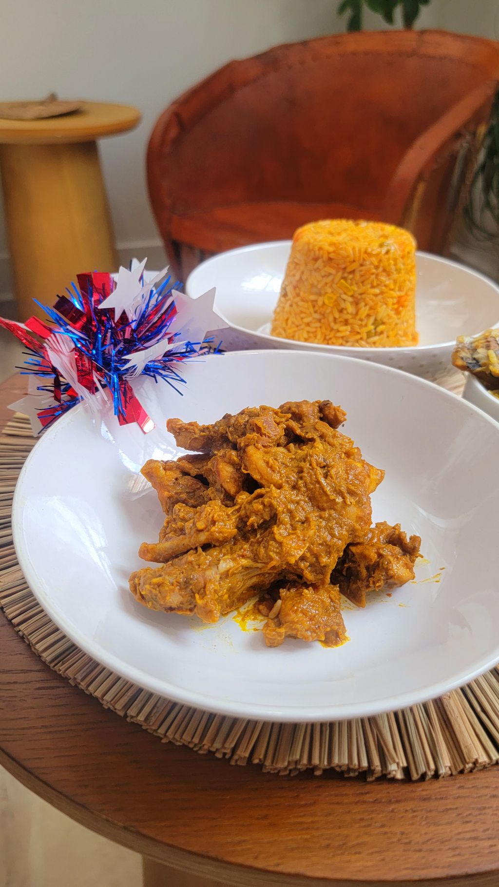 Palm Butter sauce (Foreground) and Jollof Rice (In