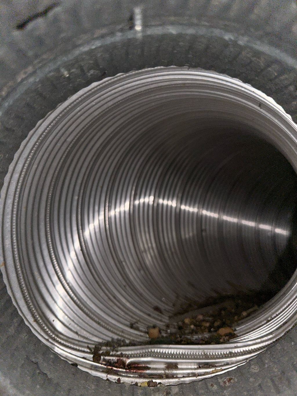 Residential air duct with debris