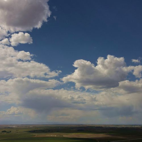 Mid-day partly cloudy skies in ~10 knot winds