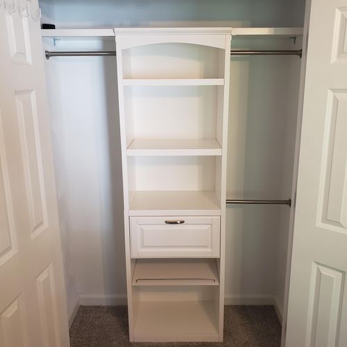 Closet shelving system assembled and installed for