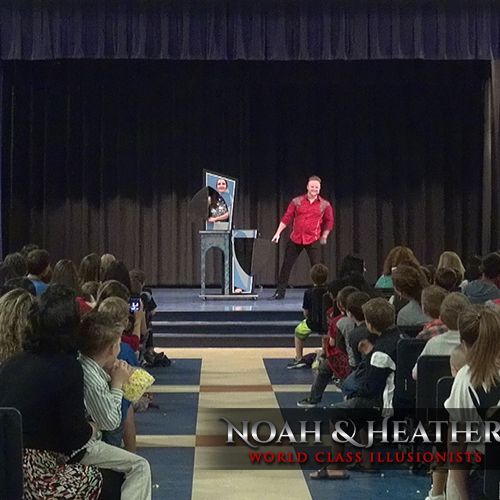 Noah & Heather performing for a school fundraising