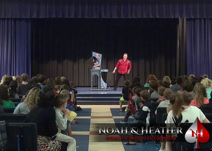 Noah & Heather performing for a school fundraising