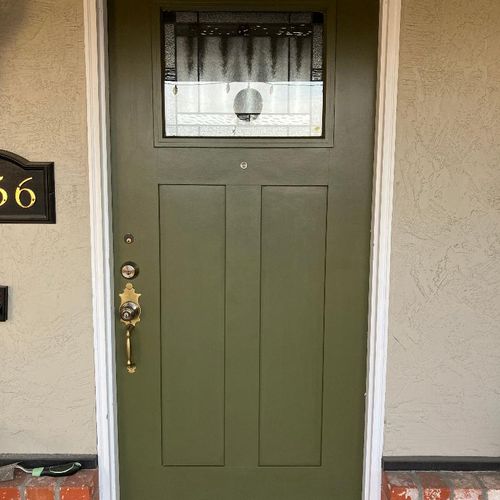 Front entry top lite shaker fiberglass door