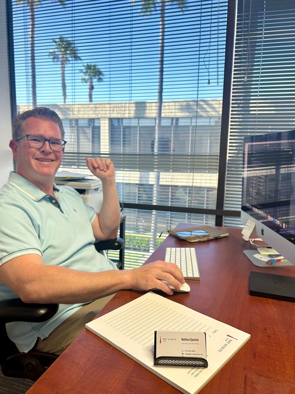 Attorney Nate Gjesdal reviewing body cam footage i