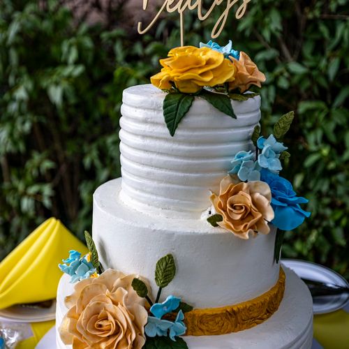 Our wedding cake and cookies were a hit with every