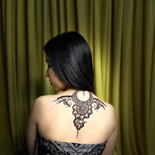 The artistry and skill in the henna design they cr