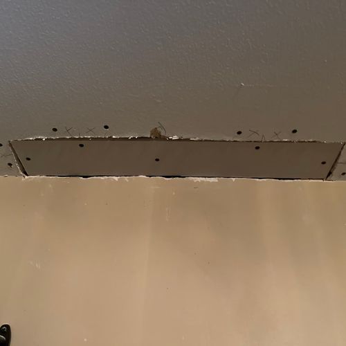 Ceiling water damage and drywall replaced. 