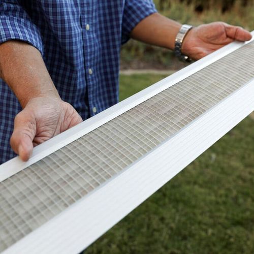 Gutter guards with a rigid support frame to hold u