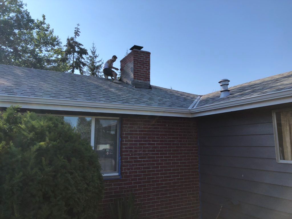 We grouted the whole chimney and painted the brick
