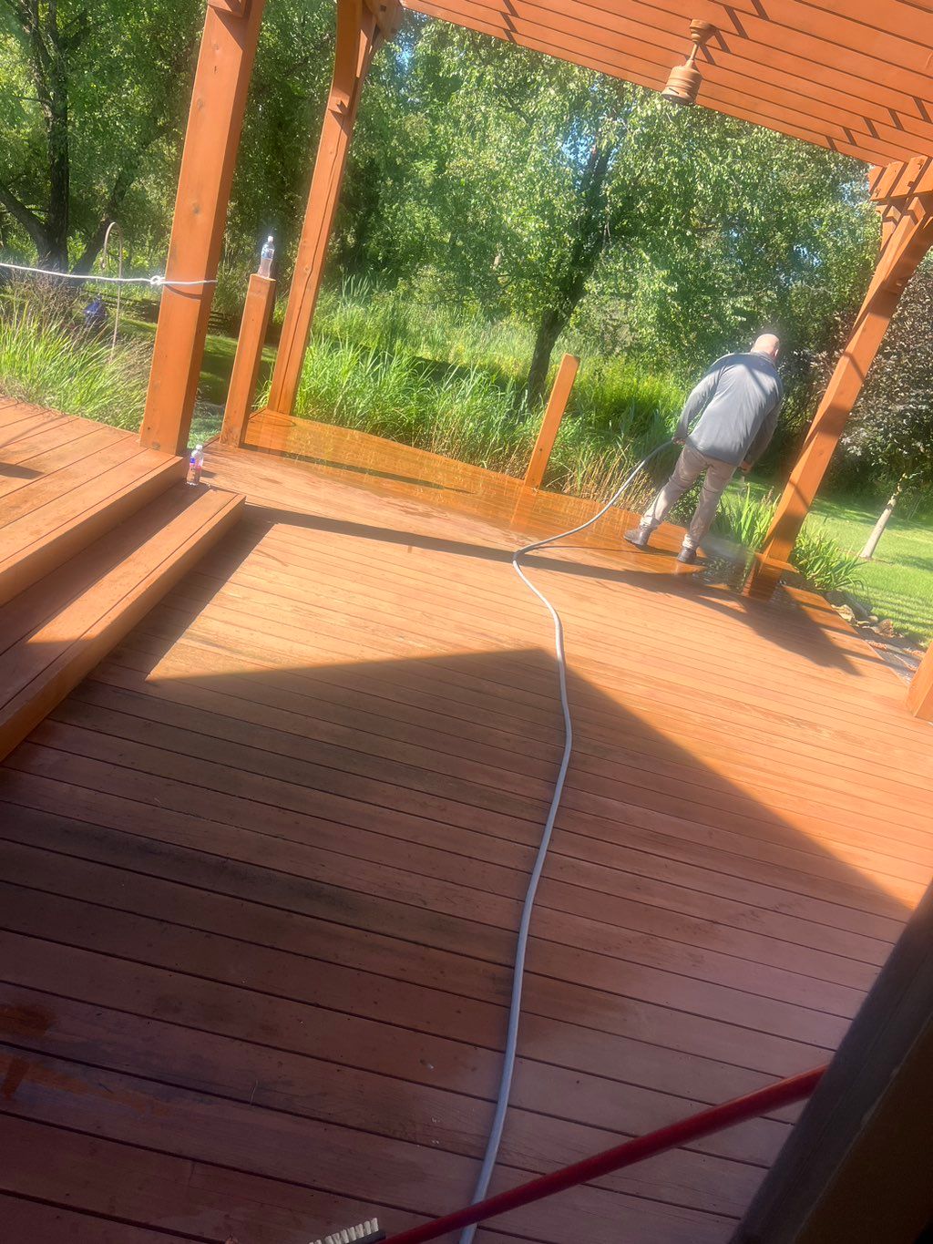 Cleaning and staining a deck