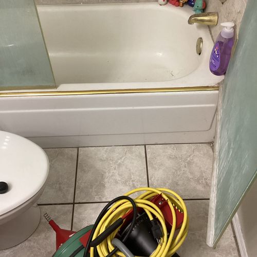 Clearing bathtub clog. 