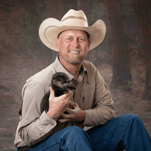 Our owner, Steve, with an orphaned otter